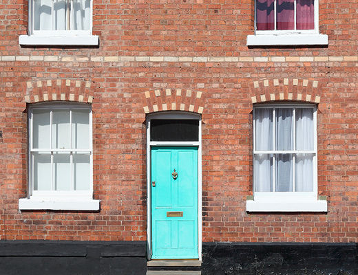 a row of painted houses as an example of home improvements