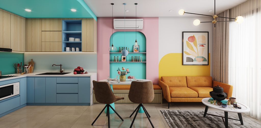 a colourful open plan kitchen and living area with an orange sofa and a pink and turquoise painted wall