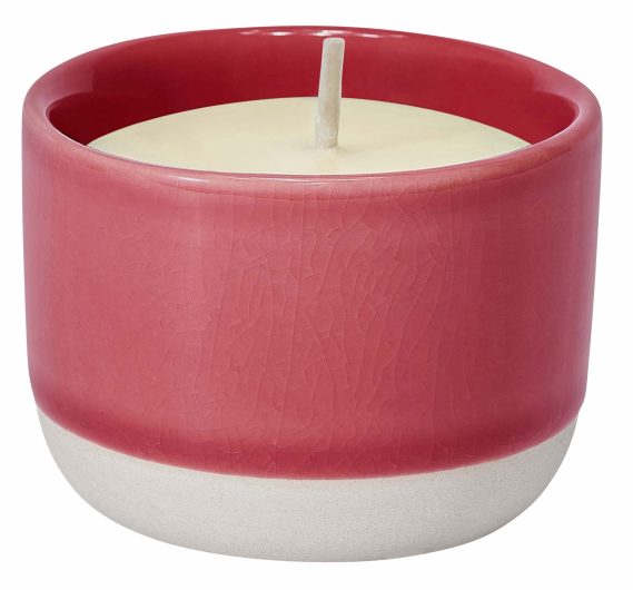 a candle in Viva Magenta, Pantone Colour of the Year 2023
