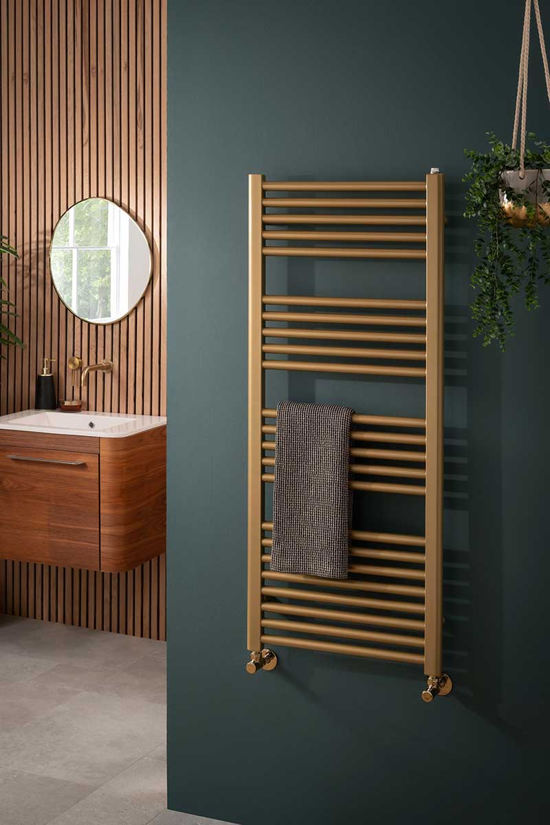 A gold radiator in a Japandi scheme 