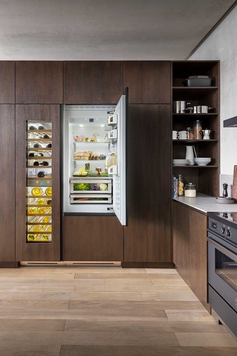 Built-in appliances such as this wine cabinet and fridge-freezer can be completely hidden 